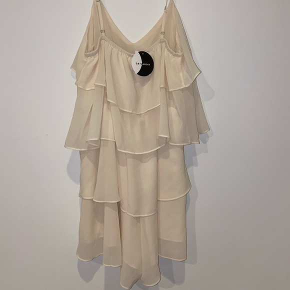 A cream flowy romper, size small - Picture 2 of 3